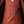 Charger l'image dans la galerie, L'image le devant d'un gilet é à double boutonnage de couleur terracotta.
La veste est en tissu texturé et présente six boutons noirs. La veste est portée sur une chemise blanche.